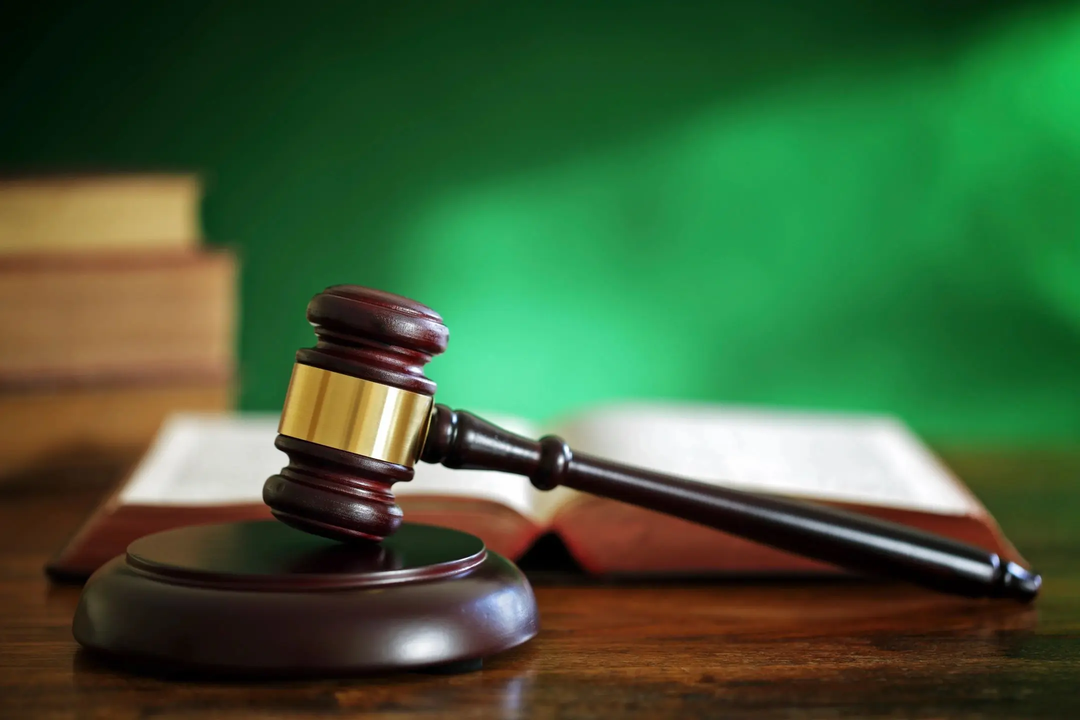 Courtroom gavel with open book