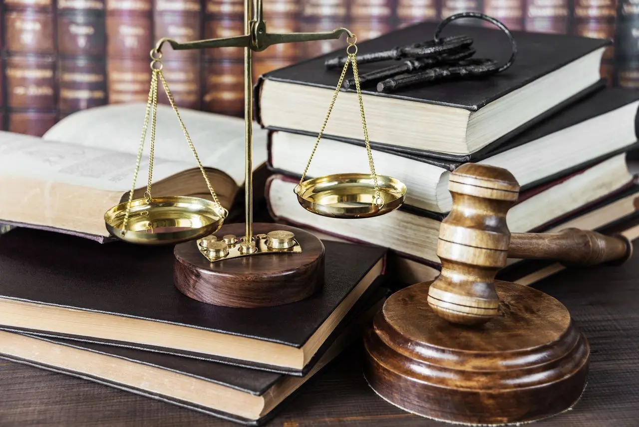 Legal books and scales of justice